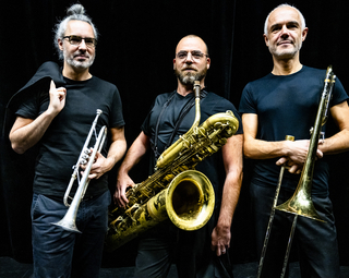 hoto des trois musiciens du groupe Journal intime