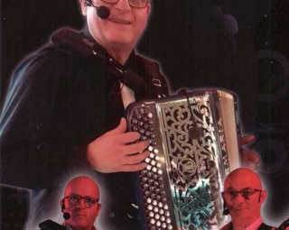 Affiche montrant Guy Roberto et son accordéon