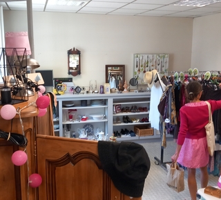 Vue de la boutique Oxalys avec une cliente